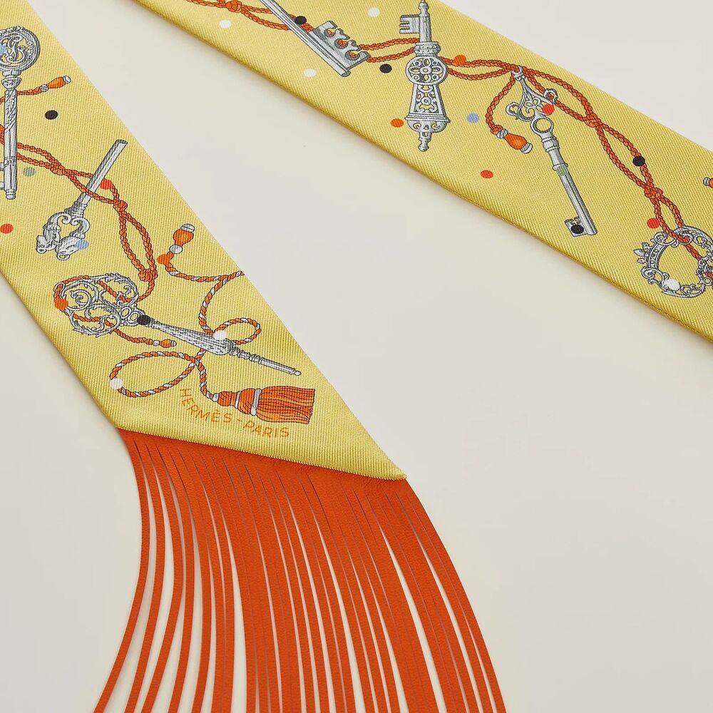 Hermès "Les Cles a Pois" Jaune, Argent and Orange Vif Fringe Silk Twilly - Picture 2 of 3